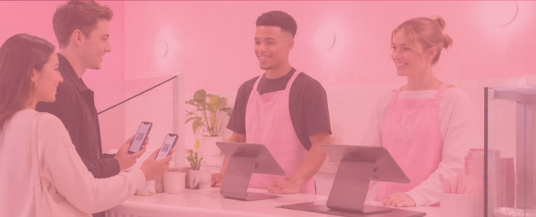 Fro Yoh team member helping a customer with rewards at the counter